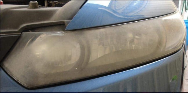 Blue car headlight restoration - before