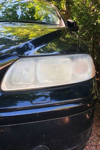 Black car headlight restoration - before