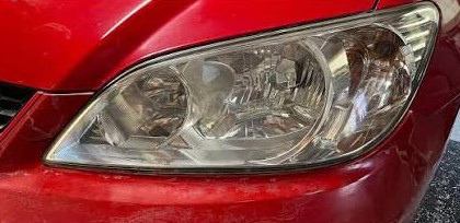 Red car headlight restoration - after